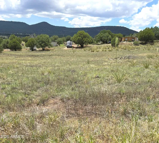 a view of an outdoor space and mountain view
