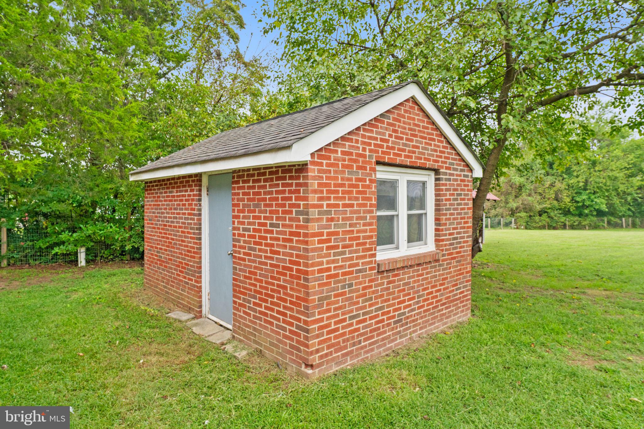 10048 Dahlgren Road King George, VA 22485 - Photo 45 of 51 Storage Shed