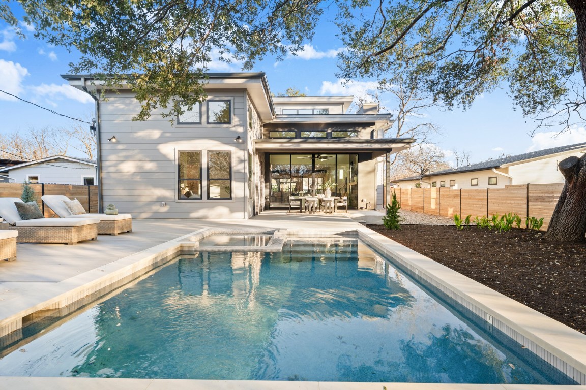 7706 Rutgers Avenue Austin, TX 78757 - Photo 17 of 35 a swimming pool view with a outdoor seating