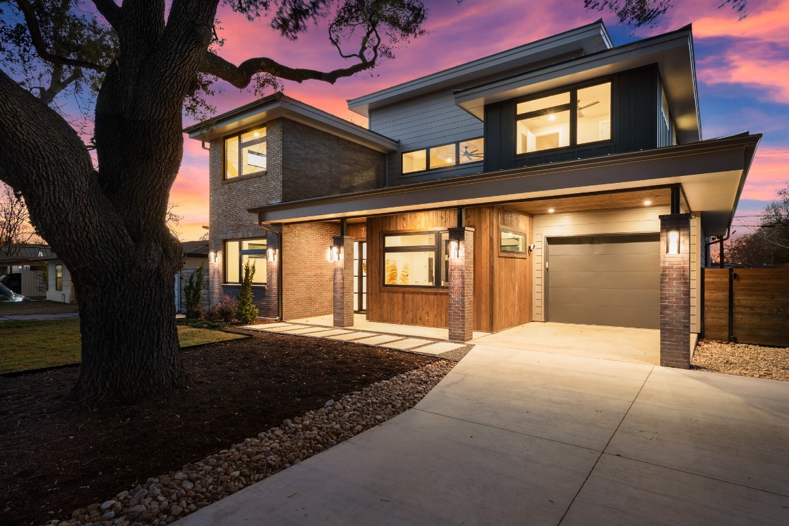 7706 Rutgers Avenue Austin, TX 78757 - Photo 33 of 35 a large building with a outdoor space