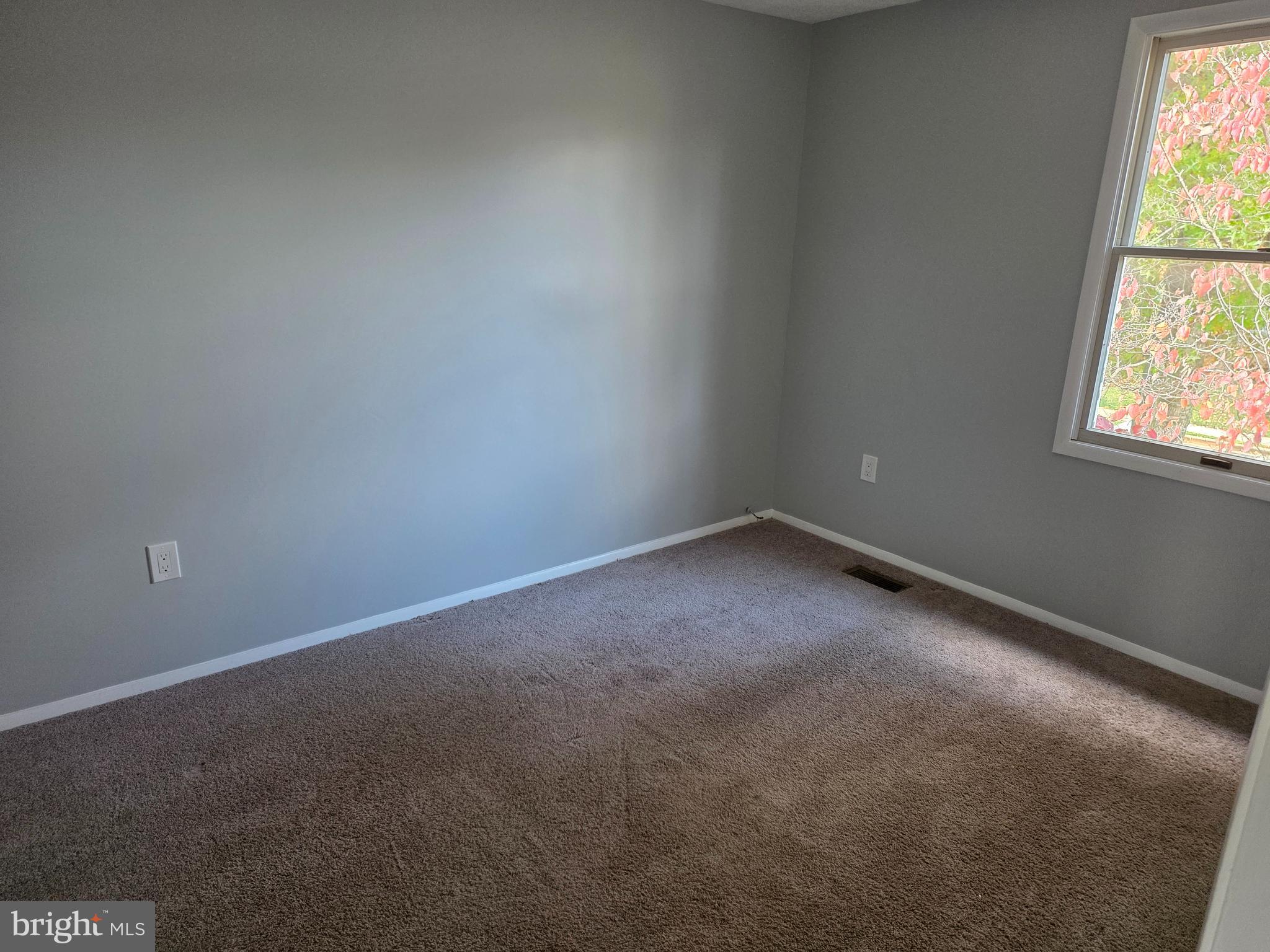 17923 Ashton Club Way Ashton, MD 20861 - Photo 15 of 21 an empty room with a window