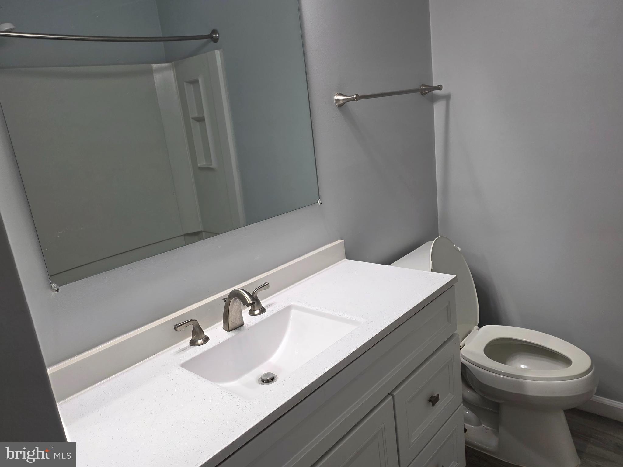 17923 Ashton Club Way Ashton, MD 20861 - Photo 7 of 21 a bathroom with a sink and a toilet