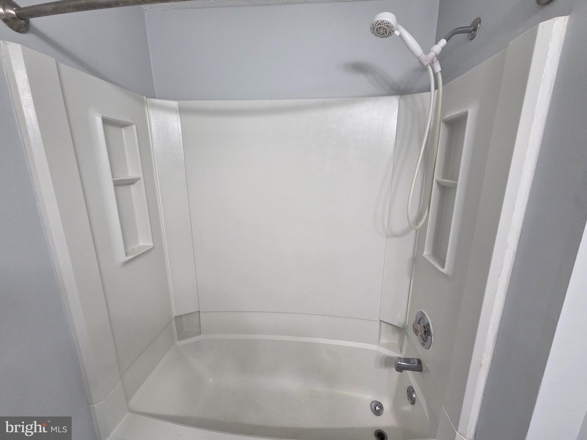 17923 Ashton Club Way Ashton, MD 20861 - Photo 9 of 21 a close view of a bathtub in shower