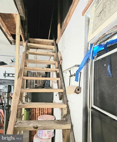 a view of a swimming pool with an outdoor space and seating area