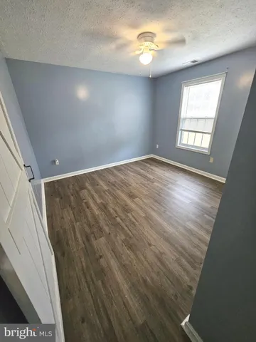 a view of a house with a big yard