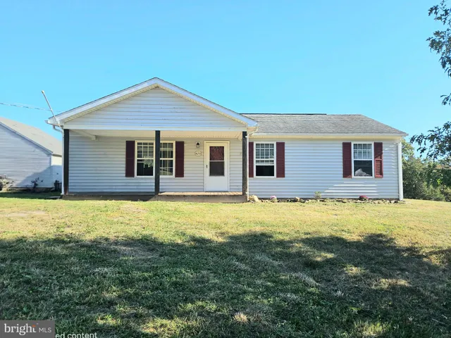 a view of a house with a large window