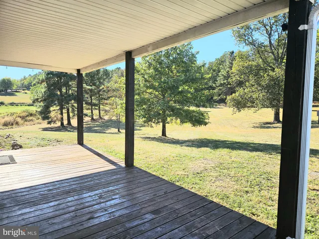 a bathroom with a sink and view of house