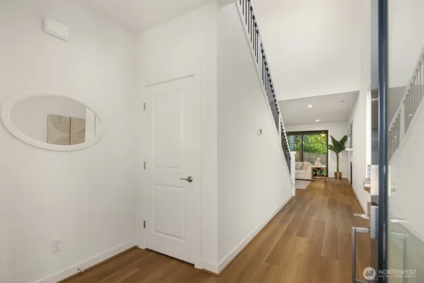 a kitchen with a sink a counter top space stainless steel appliances and cabinets
