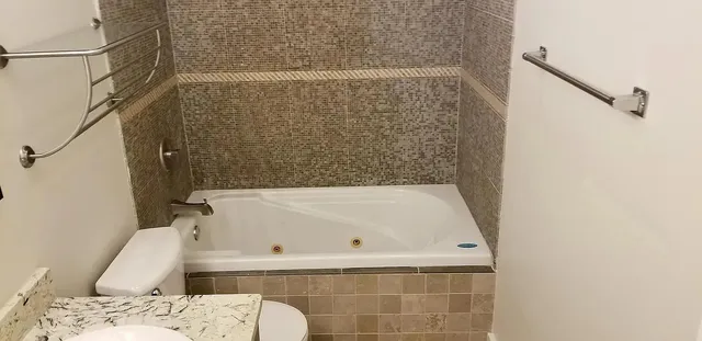 a bathroom with a bathtub