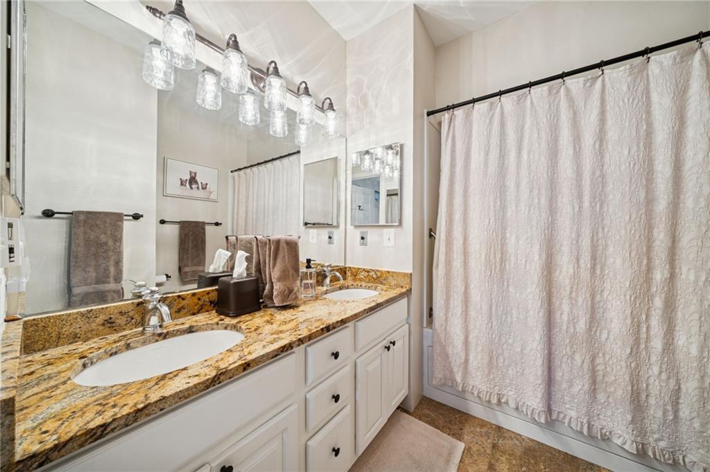 5023 Summit View Court Hidden Valley, PA 15502 - Photo 18 of 41 a bathroom with a double vanity sink and a mirror