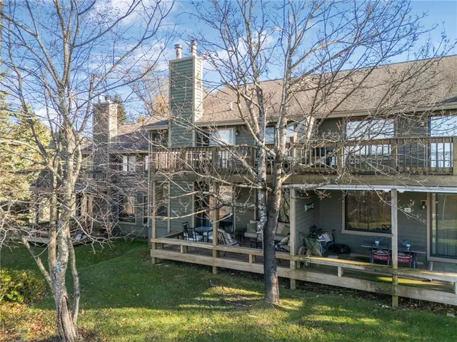 front view of a building with a yard