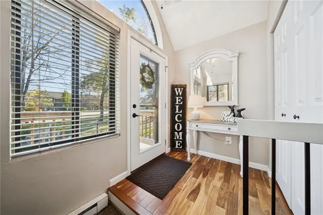 a bathroom with a sink mirror and a bathtub