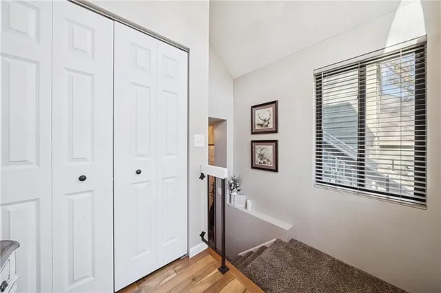 a view of entryway with wooden floor