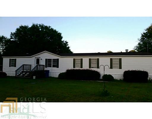 1145 Courthouse Road, Unit 7 Springfield, GA 31329 - Photo 1 of 1 a black and white photo of a garden