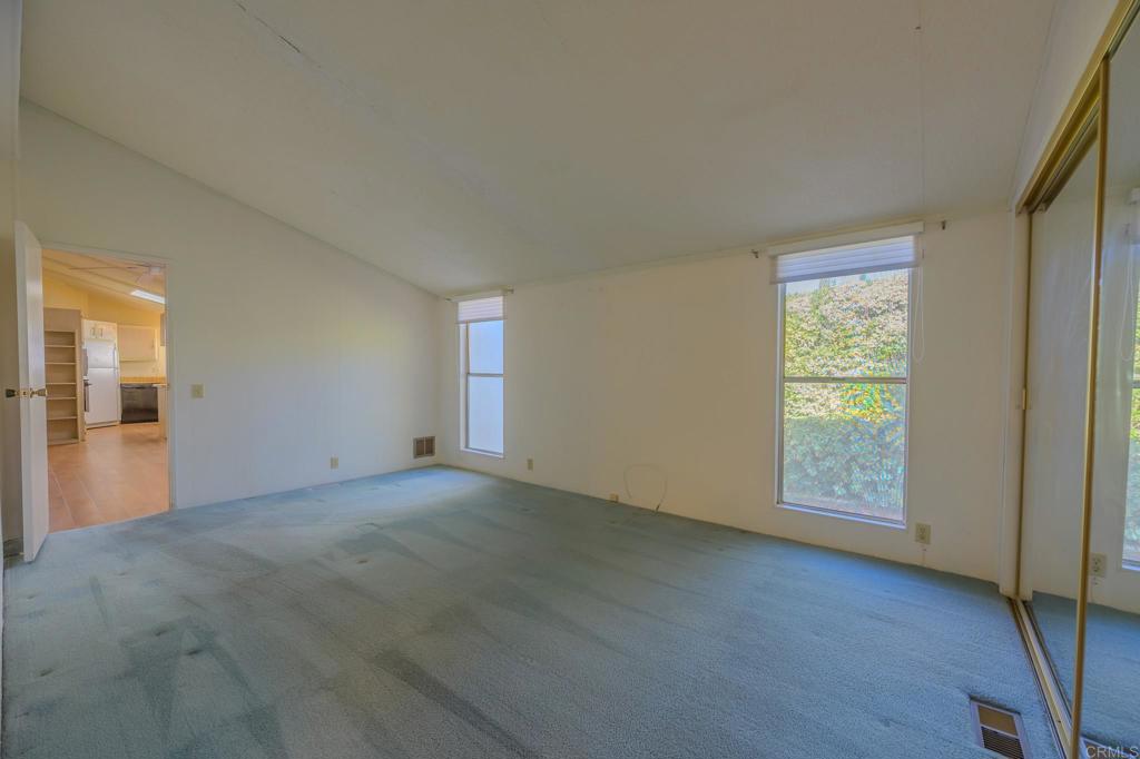 4650 Dulin Road, Unit 153 Fallbrook, CA 92003 - Photo 15 of 24 an empty room with windows