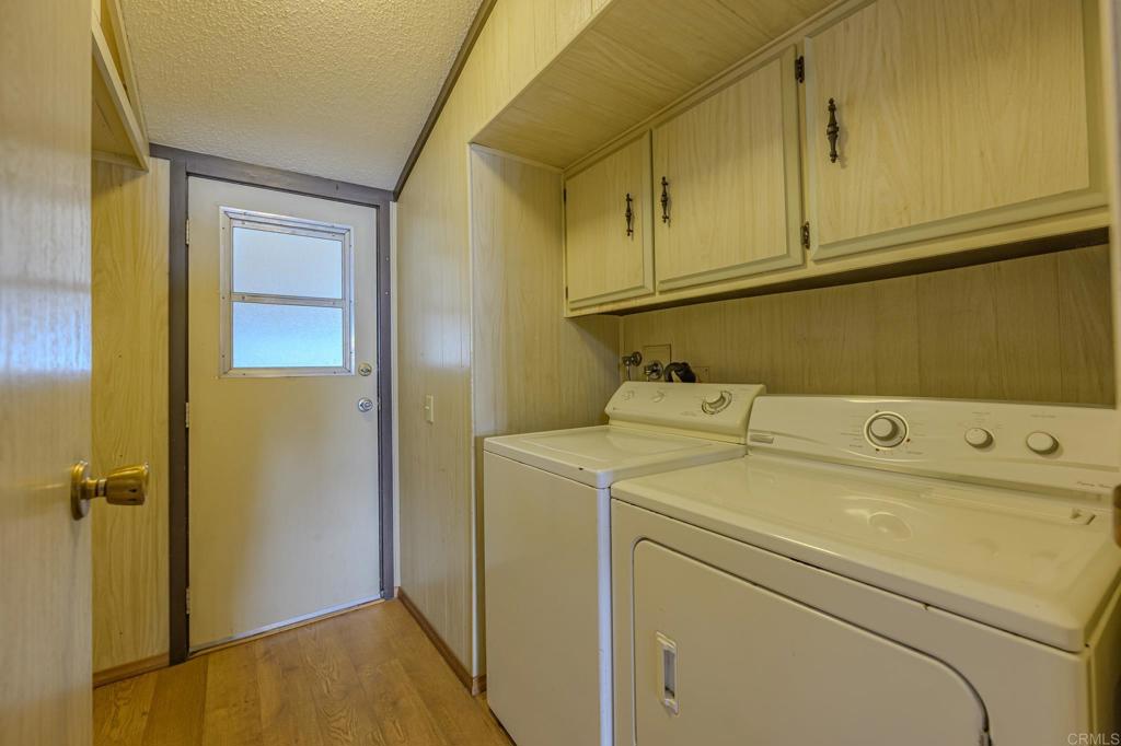 4650 Dulin Road, Unit 153 Fallbrook, CA 92003 - Photo 18 of 24 a utility room with dryer and washer