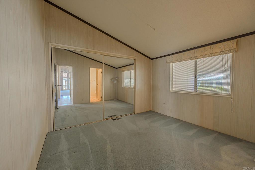 4650 Dulin Road, Unit 153 Fallbrook, CA 92003 - Photo 19 of 24 an empty room with windows
