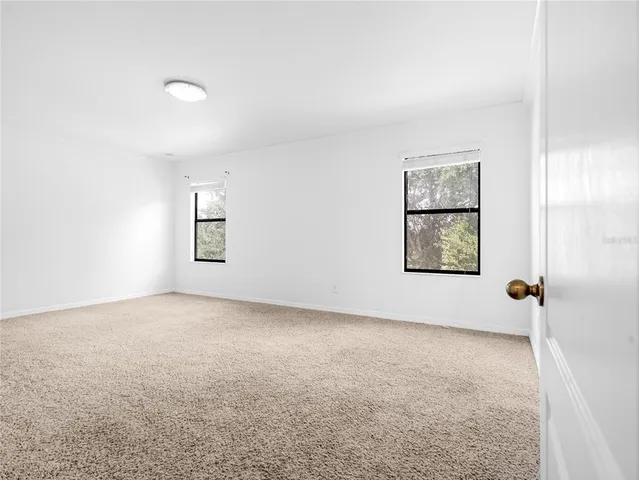 a living room with a rug