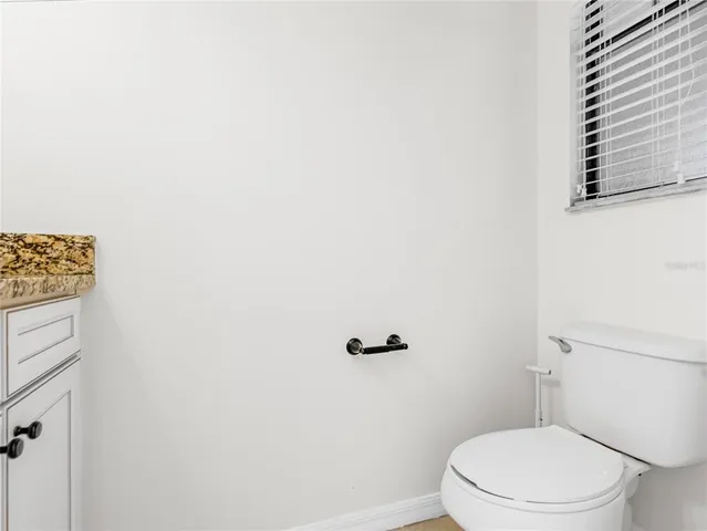 a view of entryway and hall with a window