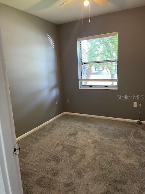 2501 Sheridan Road Mount Dora, FL 32757 - Photo 14 of 33 an empty room with a window