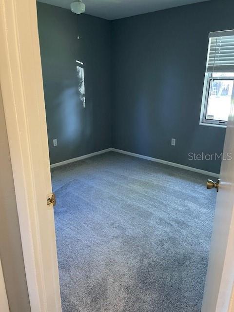 2501 Sheridan Road Mount Dora, FL 32757 - Photo 15 of 33 an empty room with windows