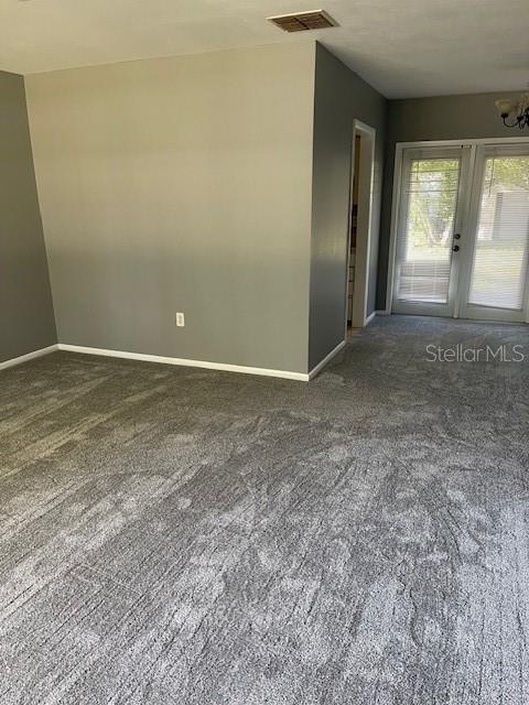 2501 Sheridan Road Mount Dora, FL 32757 - Photo 17 of 33 an empty room with windows