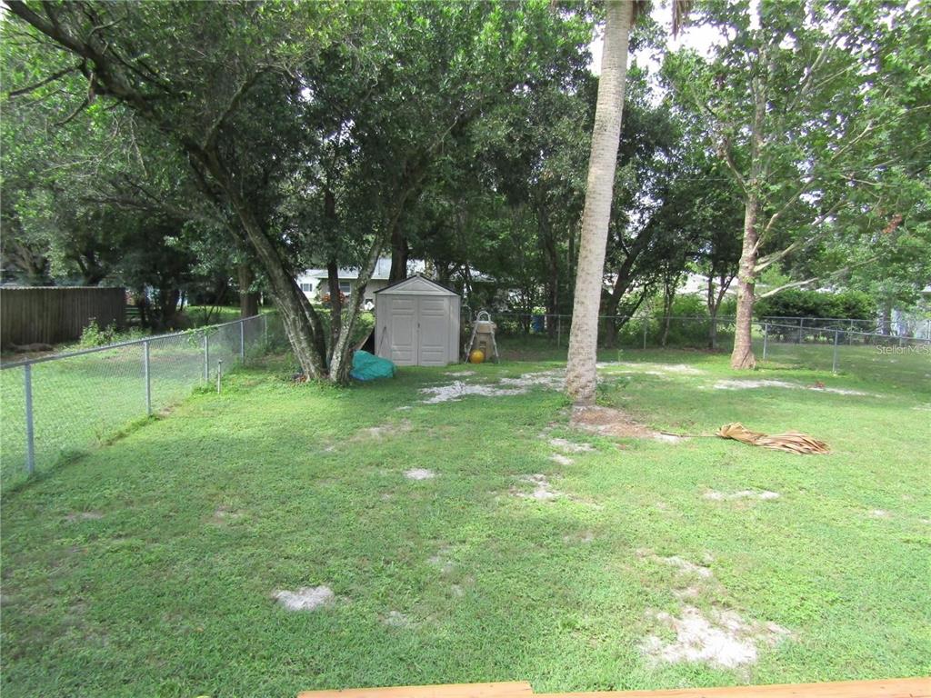 2501 Sheridan Road Mount Dora, FL 32757 - Photo 30 of 33 a view of a park with large trees