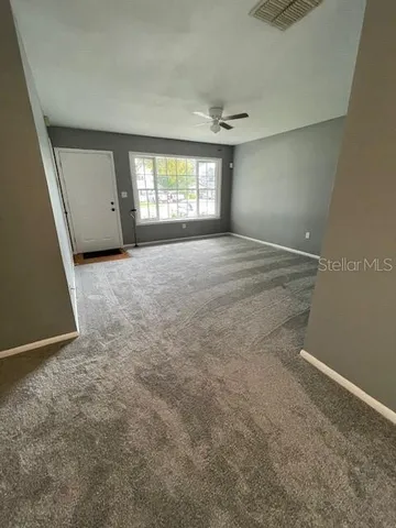 an empty room with windows