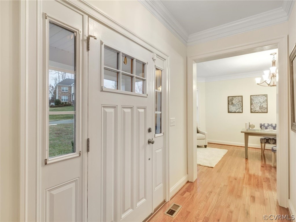 1219 Miners Trail Road Midlothian, VA 23114 - Photo 3 of 32 Bright foyer with wood floors and crown detail.