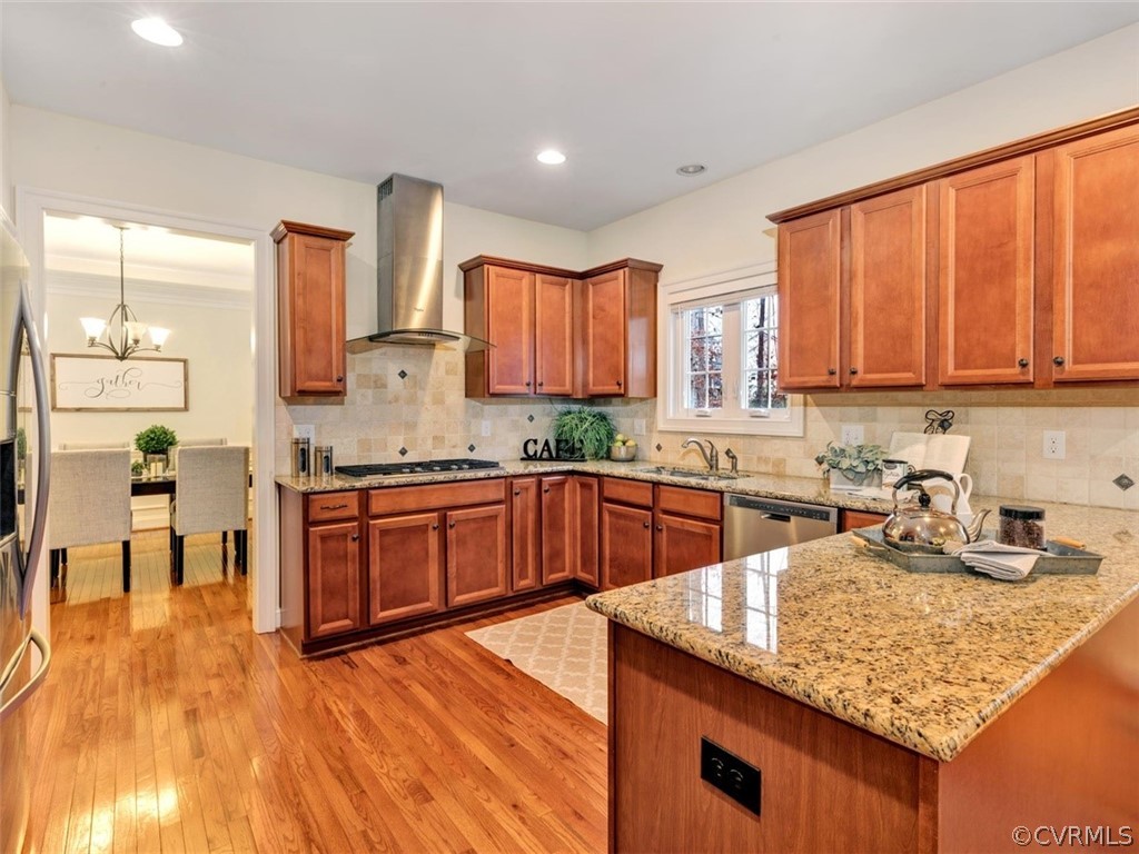 1219 Miners Trail Road Midlothian, VA 23114 - Photo 9 of 32 Stunning kitchen featuring wood floors, stone back