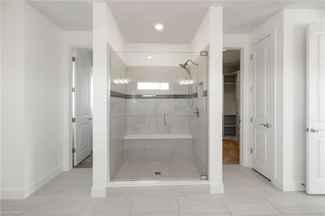 a view of staircase and kitchen with sink