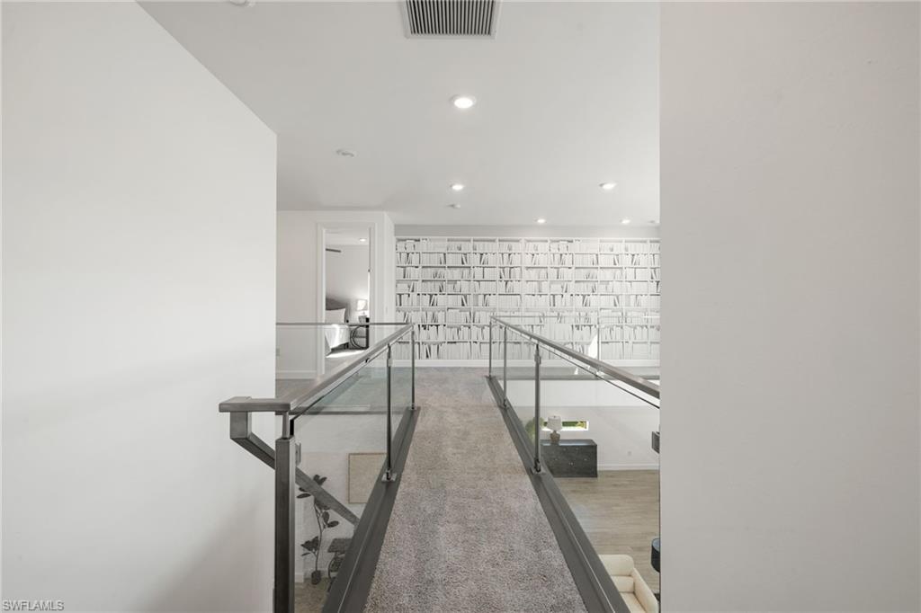 19824 Beverly Park Road Estero, FL 33928 - Photo 30 of 50 Hall with recessed lighting and baseboards