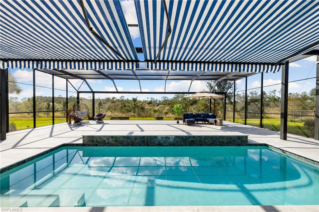 19824 Beverly Park Road Estero, FL 33928 - Photo 35 of 50 a view of swimming pool
