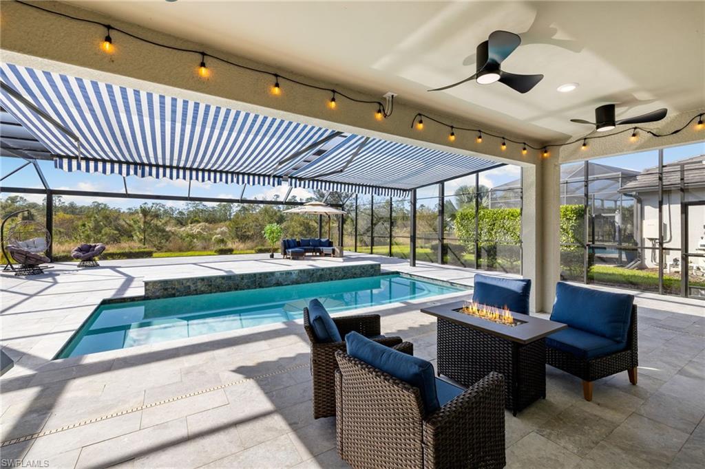 19824 Beverly Park Road Estero, FL 33928 - Photo 39 of 50 a outdoor space with lots of tables and chairs