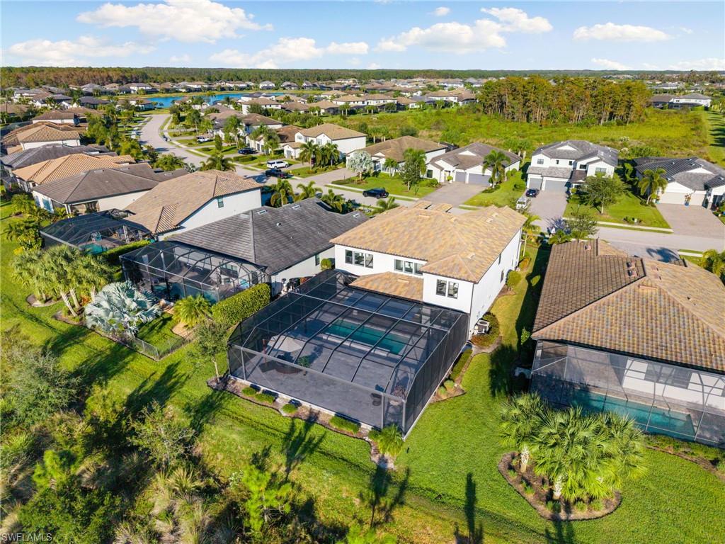 19824 Beverly Park Road Estero, FL 33928 - Photo 47 of 50 an aerial view of multiple house