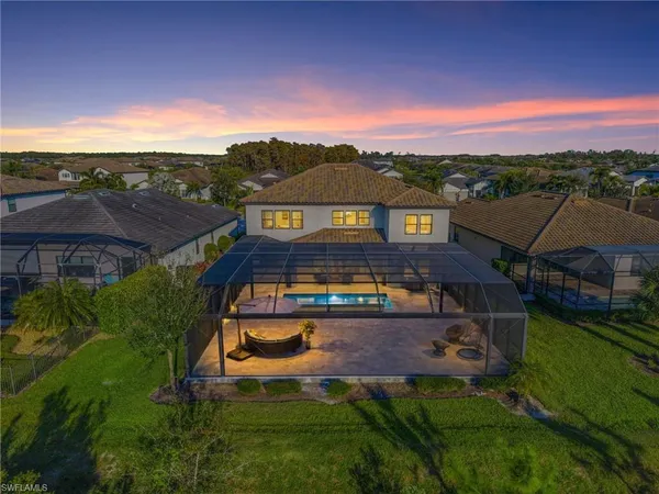 an aerial view of a house with a garden