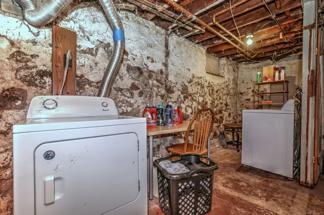 a utility room with dryer and washer