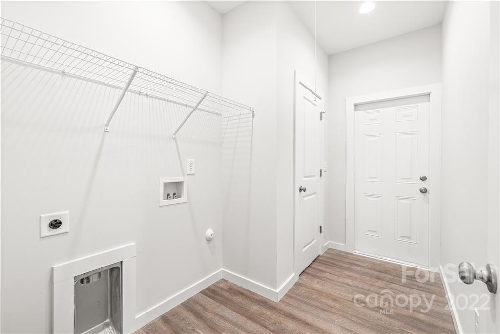 8621 Reedy Creek Road Charlotte, NC 28215 - Photo 22 of 22 a view of a room with wooden floor