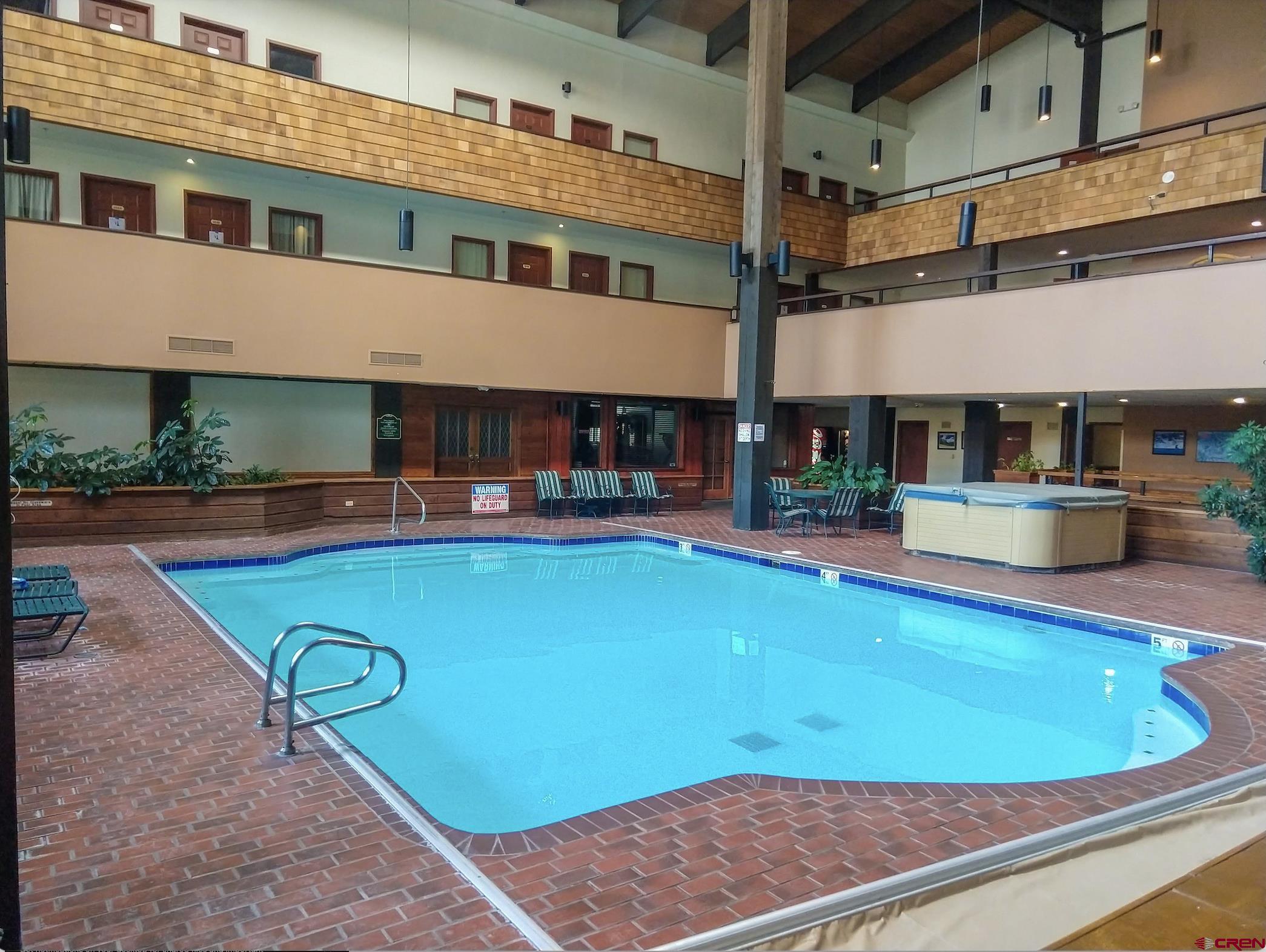 701 Gothic Road, Unit 338 Crested Butte, CO 81225 - Photo 34 of 42 a view of an chairs and tables in the patio