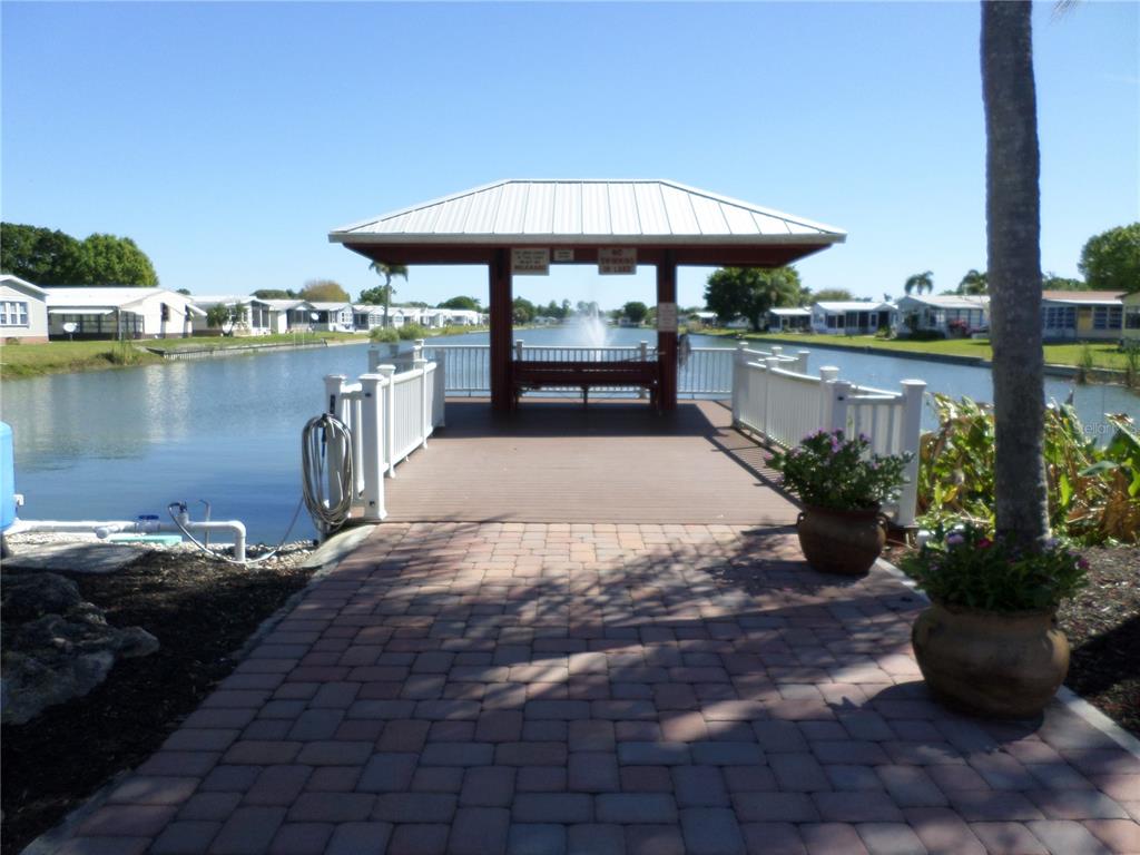 1690 Southwest 35th Circle Okeechobee, FL 34974 - Photo 4 of 23 a view of a swimming pool with a patio