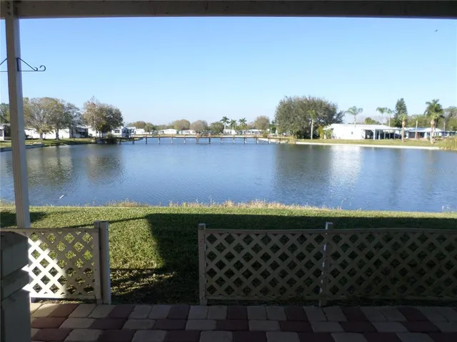 a view of a lake with a city