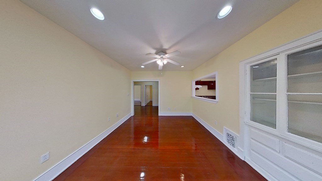 3 Dunlap Street Boston, MA 02124 - Photo 13 of 42 a view of a livingroom with a ceiling fan and window