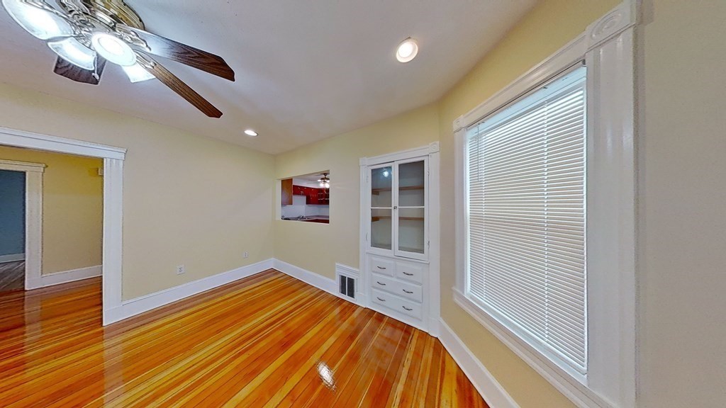 3 Dunlap Street Boston, MA 02124 - Photo 17 of 42 a view of empty room with wooden floor