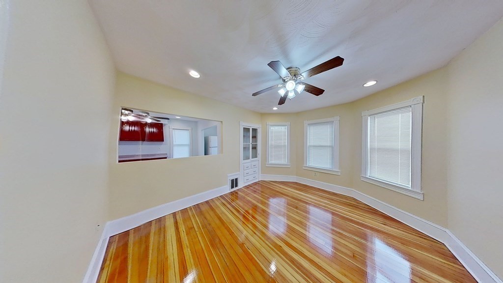 3 Dunlap Street Boston, MA 02124 - Photo 18 of 42 a view of empty room with wooden floor