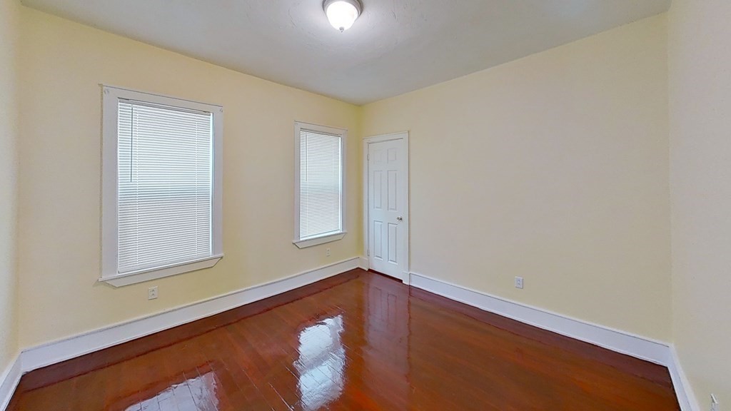 3 Dunlap Street Boston, MA 02124 - Photo 32 of 42 an empty room with windows