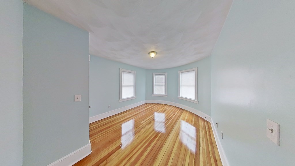3 Dunlap Street Boston, MA 02124 - Photo 34 of 42 a view of an empty room and window