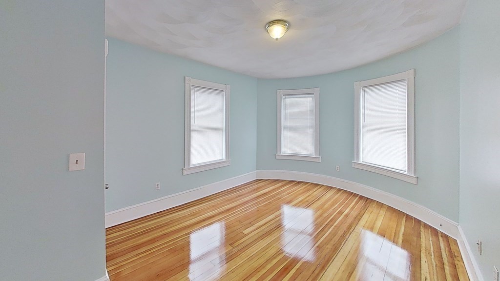 3 Dunlap Street Boston, MA 02124 - Photo 38 of 42 a view of an empty room and window