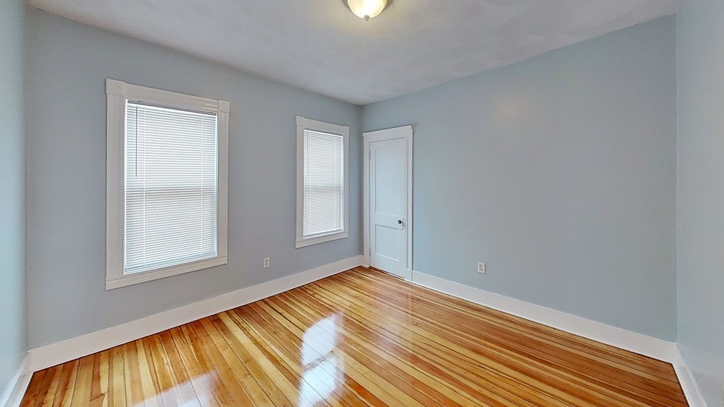 3 Dunlap Street Boston, MA 02124 - Photo 39 of 42 a view of an empty room and window