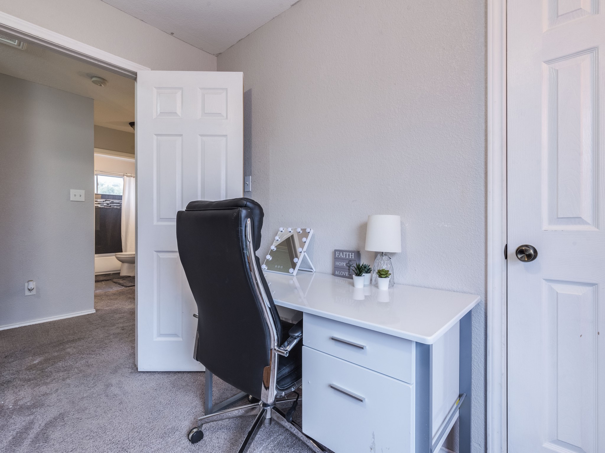 1415 Roxanne's Run Pflugerville, TX 78660 - Photo 22 of 30 A dedicated home office space with ample room for productivity and a comfortable work setup.