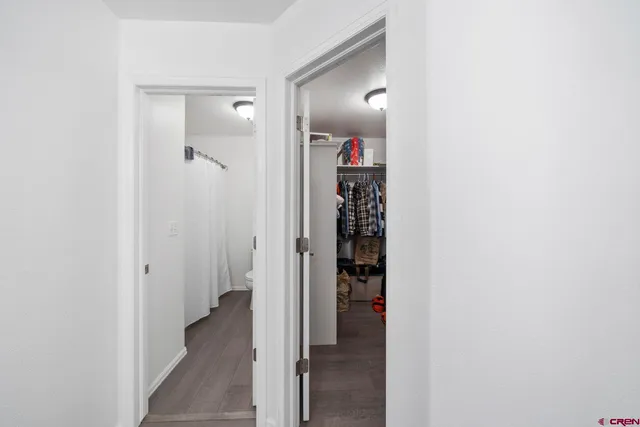 a view of a bathroom with a sink and shower
